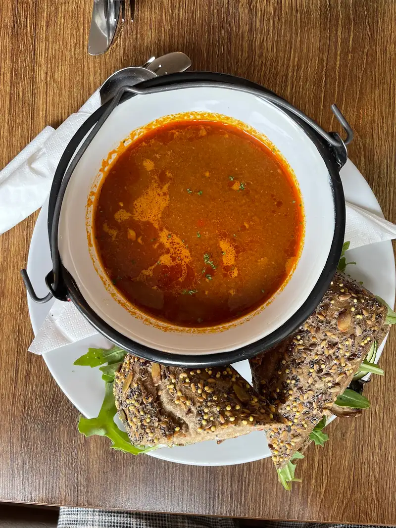 Bowl of soup served with homemade seeded soda bread